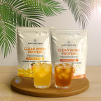 Clear Whey Protein Naturecan w smakach mango i pomarańcza oraz mrożona herbata brzoskwiniowa